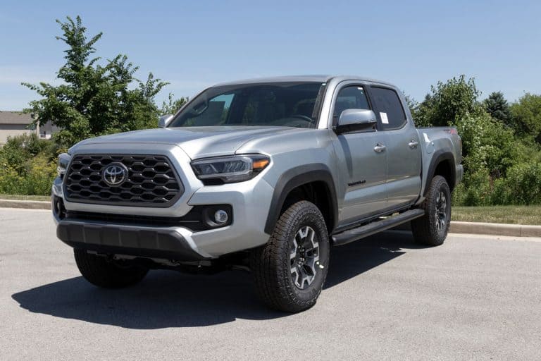 A gray colored Toyota Tacoma at a parking lot, How To Reset Distance To Empty In Toyota Tacoma?