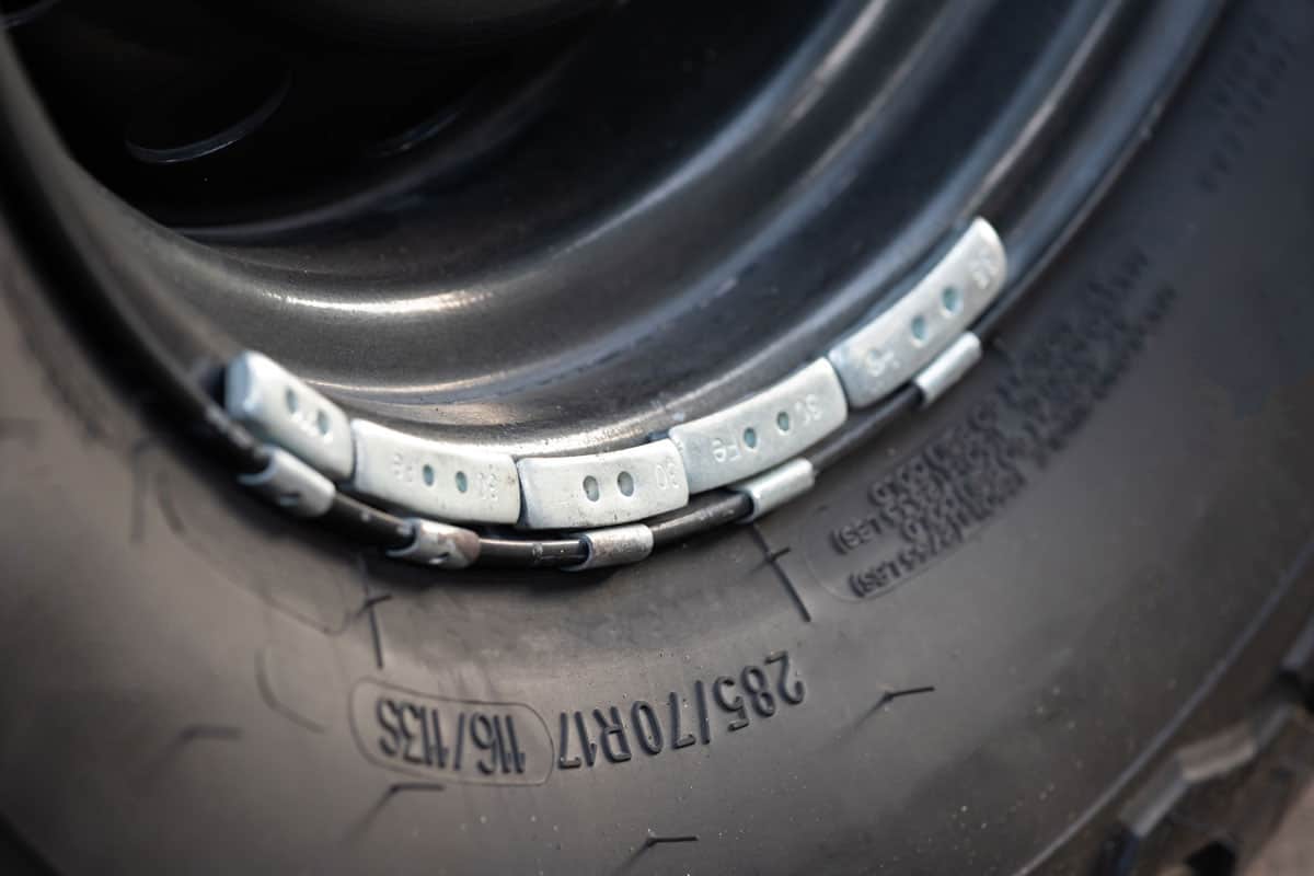 Car tire size and detail engraved on the side of the tire