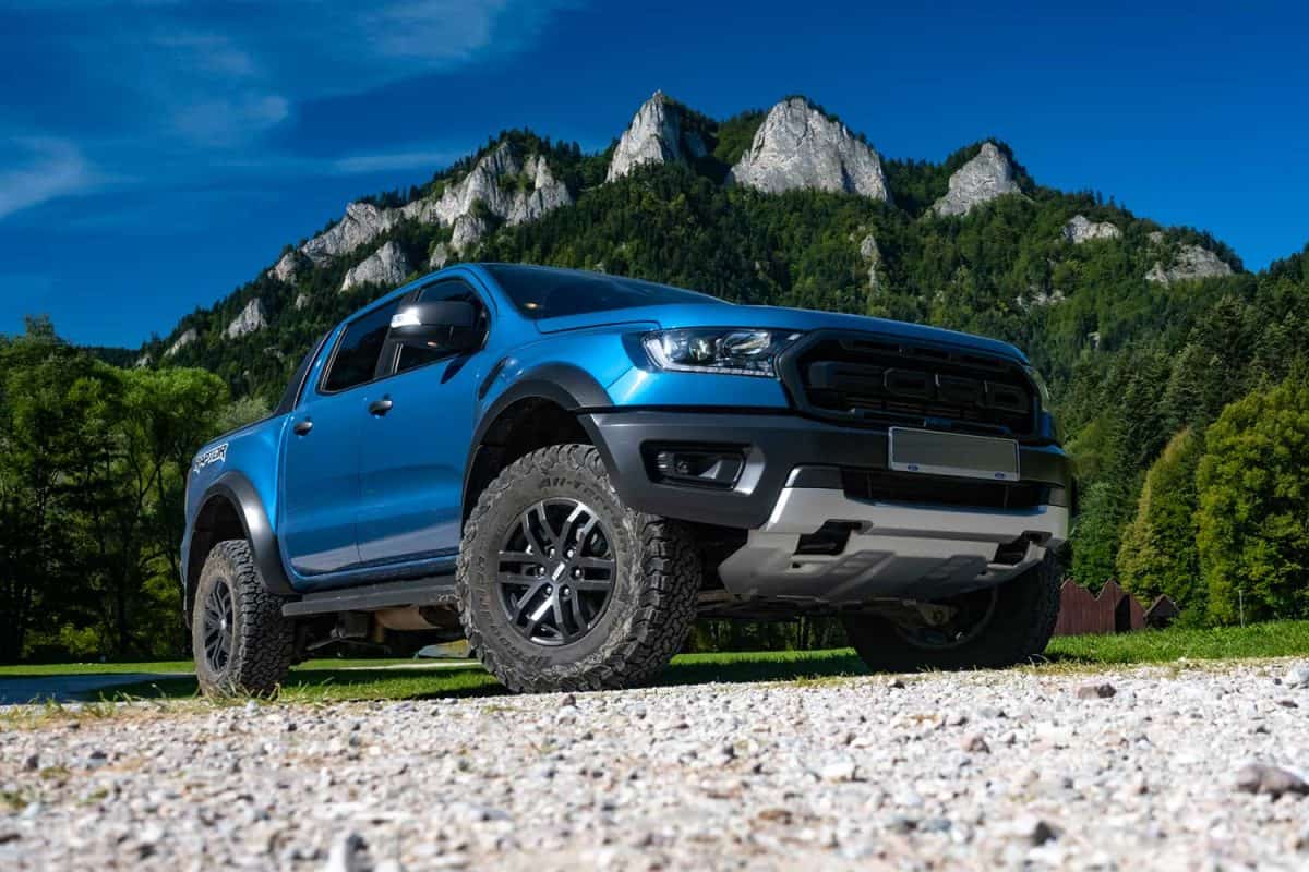 Ford Ranger Raptor on a road in mountain scenery