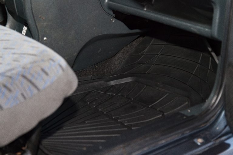 A wet car floor mats under passenger seat, Water In Floorboard Of Truck - Why And What To Do?