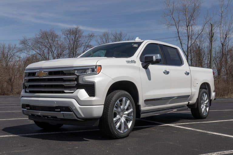 photo of a glossy metallic white latest model chevrolet silverado on the outdoor car parking lot of the mall, Chevy Silverado Fuel Efficiency Drop - What To Do?