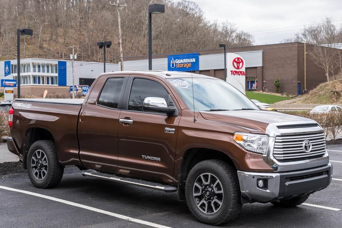 A used Toyota Tundra for sale at a dealership on a spring day, How to debadge a Toyota Tundra