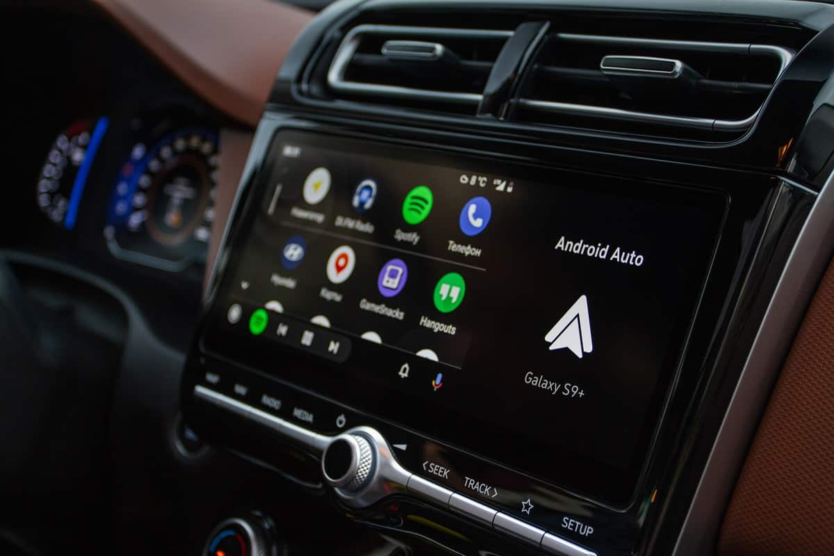 Android Auto - Android Auto on the screen. Homescreen. Modern car. Interior close up