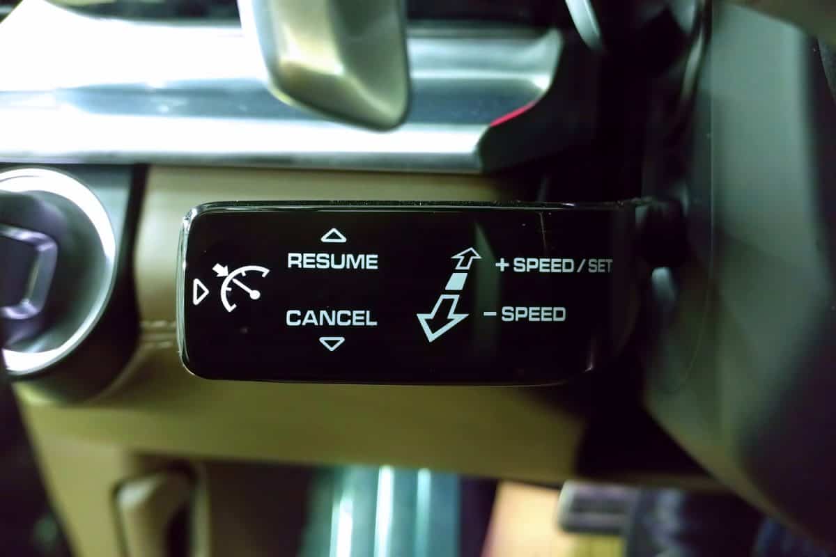 Black glossy Cruise control selector switch under the steering wheel of premium car
