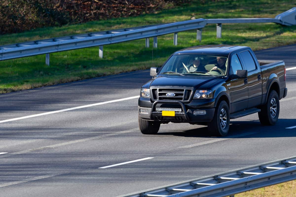 Ford 11th generation F 150 pick-up truck driving on the Dutch A1 highway