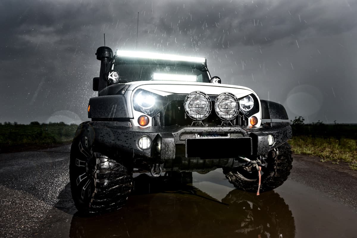 Jeep Gladiator photographed under the heavy rain