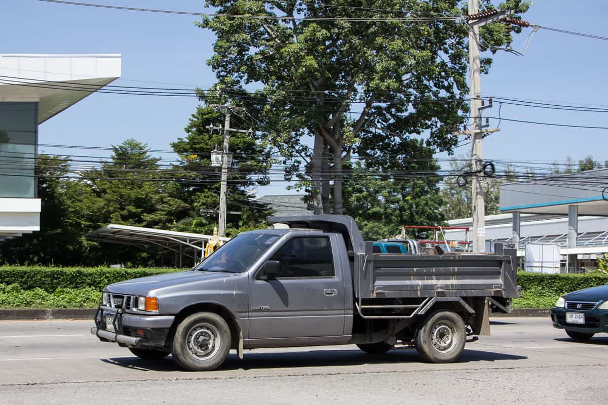 photo of a Private Isuzu TFR Pickup Truck on the city road