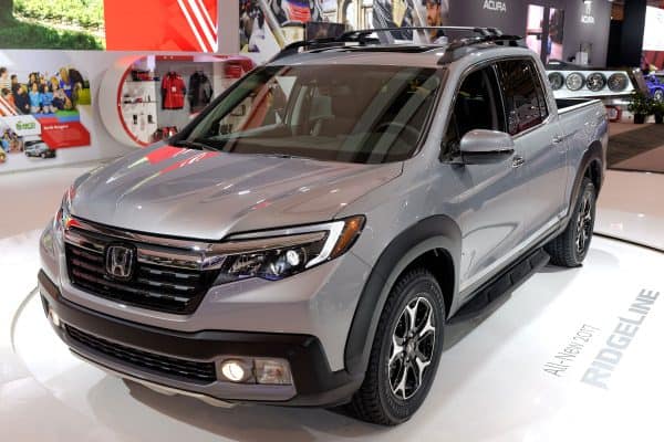 photo of a brand new silver metallic honda ridgeline on the car display, Honda Ridgeline Windows Opening By Themselves - Why And What To Do?