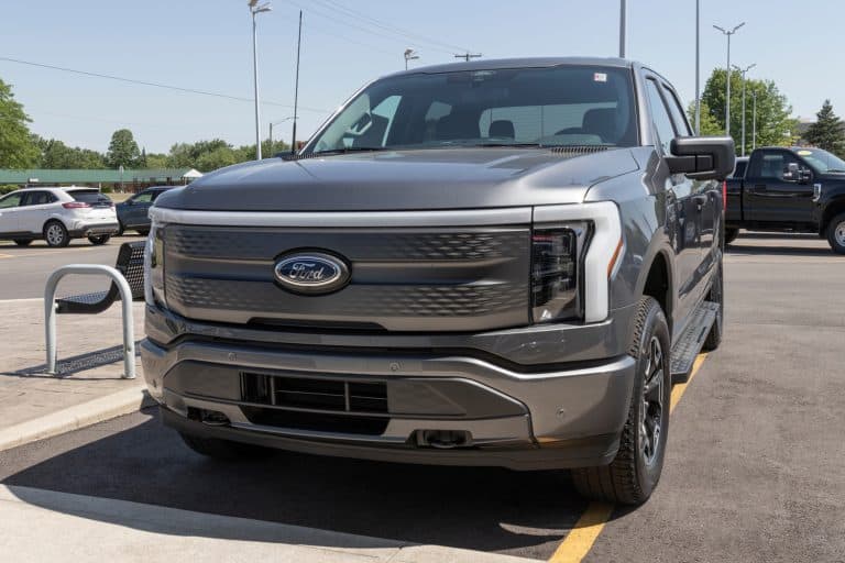 Ford F-150 Lightning display. Ford offers the F150 Lightning all-electric truck in Pro, XLT, Lariat, and Platinum models - What Does Trans Fault Mean On A Ford F-150