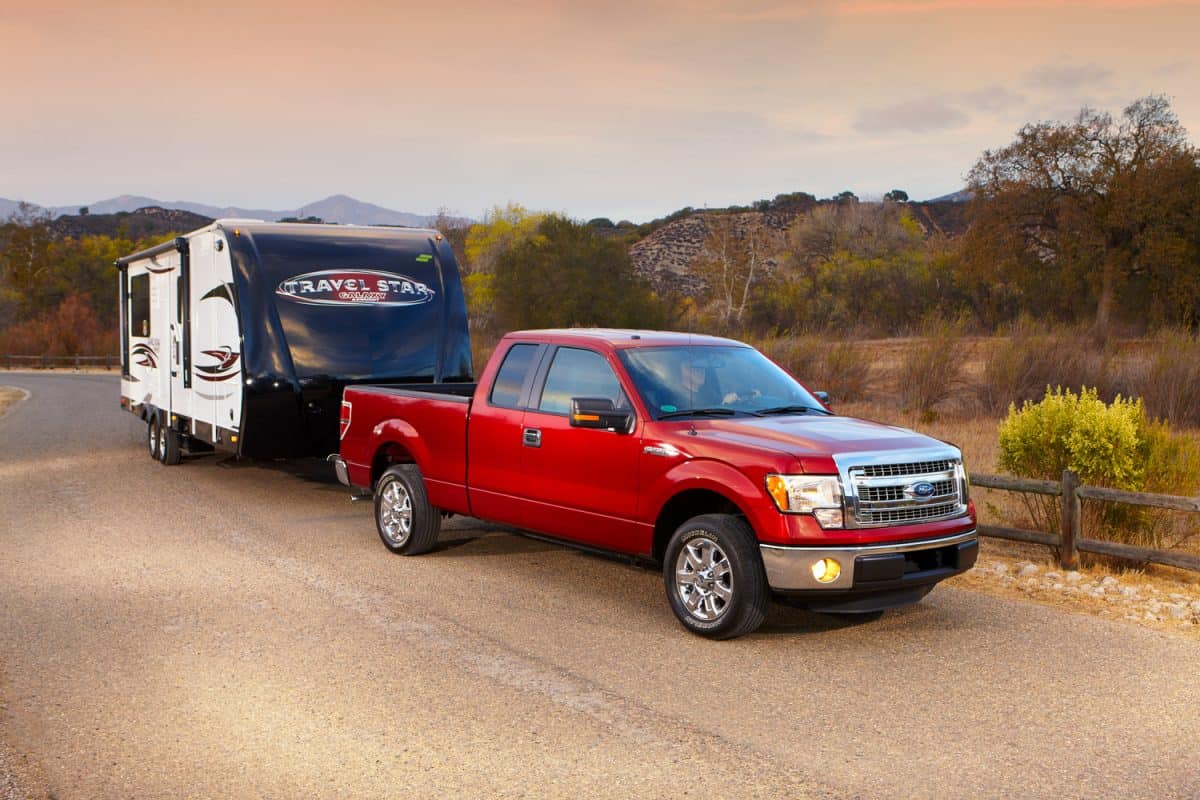 Travel Star trailer pulled by F150 Ford pickup at sunset