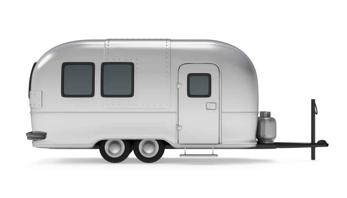 Vintage Camper Trailer isolated on white background.