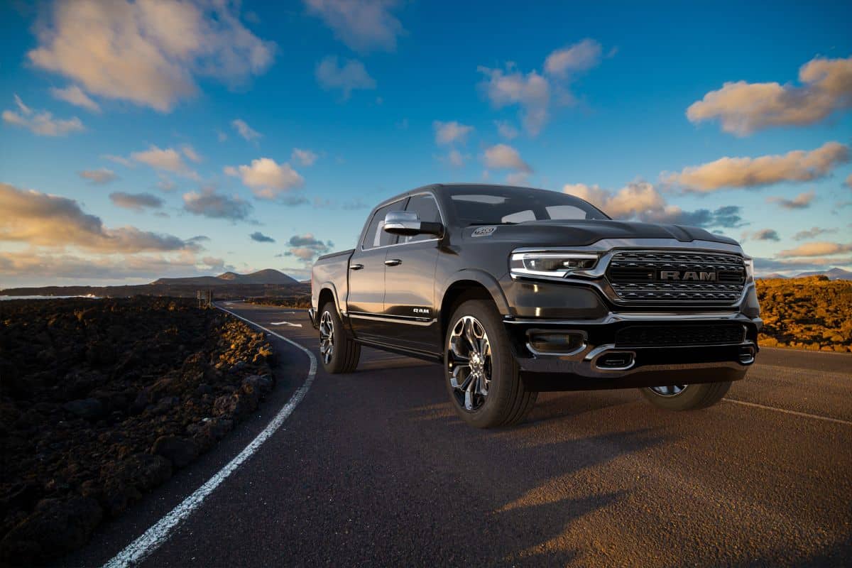 Dodge RAM 1500 on the road leading through the volcanic landscape of Lanzarote