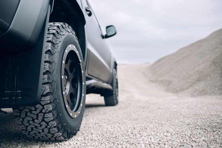 pickup car stopped on dirt road dusty dry gravel, What Are The Best Tires For Pickup Trucks?